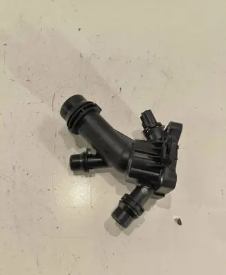 Thermostat/thermostat housing