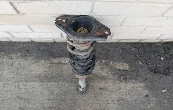 Nissan Primera Rear shock absorber with coil spring 
