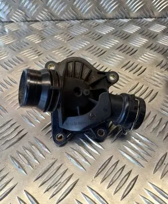 Thermostat/thermostat housing