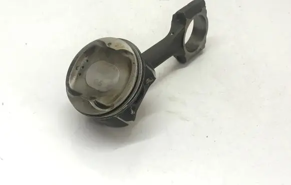 Piston with connecting rod