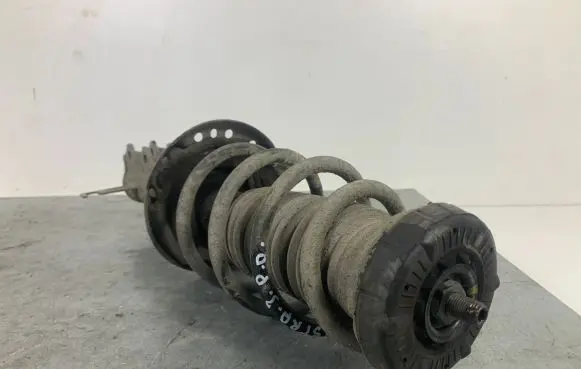Opel Astra J Front shock absorber with coil spring 13412612