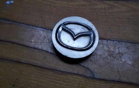 Mazda 626 Non-original wheel cap 2477 E2512