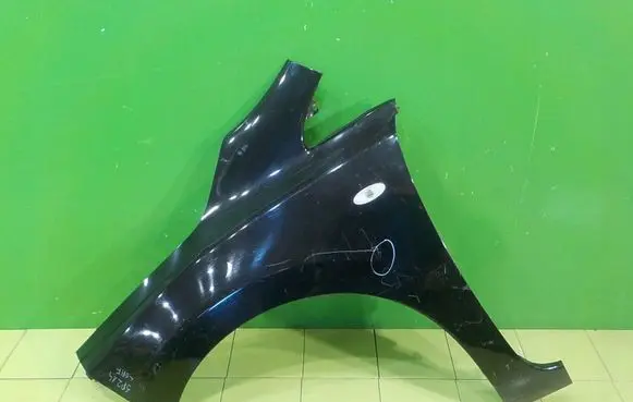 Nissan Leaf I (ZE0) Fender PRZOD LEWY