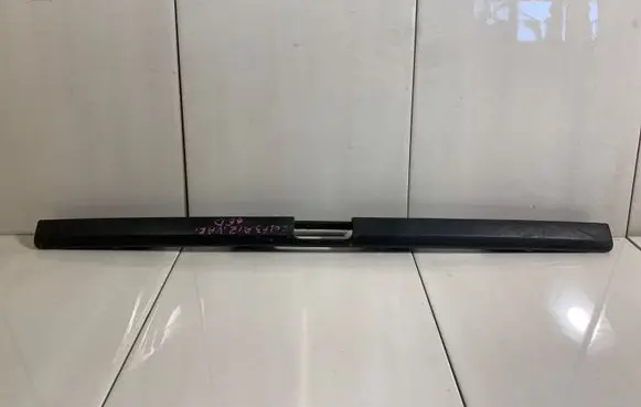 Volkswagen Golf III Trunk door license plate light bar 1H6827577