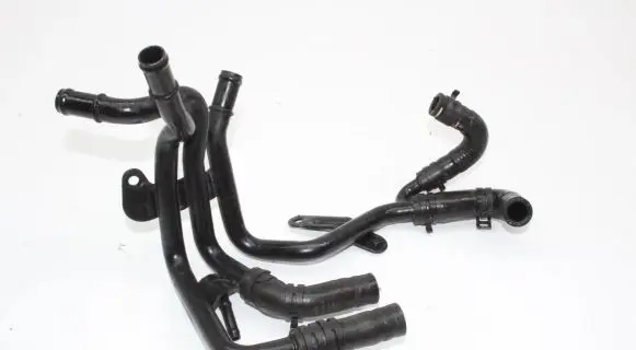 Volkswagen PASSAT B8 Engine coolant pipe/hose 04L121064AM