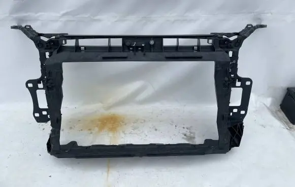 Radiator support slam panel