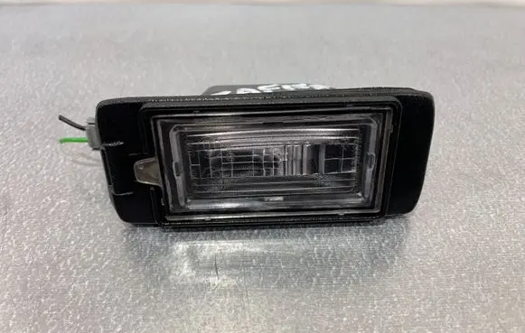 Opel Zafira C Number plate light 13578958