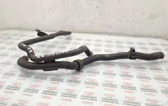 Volkswagen PASSAT B7 Engine coolant pipe/hose 1K0133687B 3AA122109B