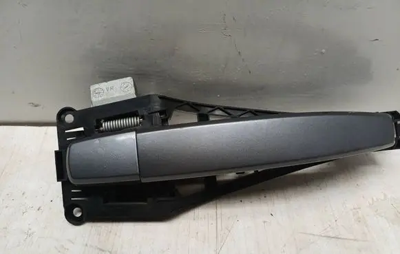 Opel Zafira B Front door exterior handle 24463524