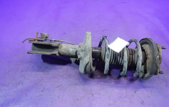 Mazda 323 Front shock absorber with coil spring