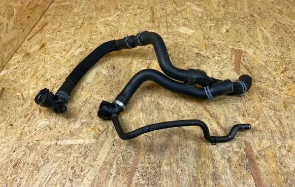 Volkswagen Golf VII Engine coolant pipe/hose 5Q0121049CR