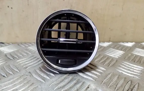 Dash center air vent grill