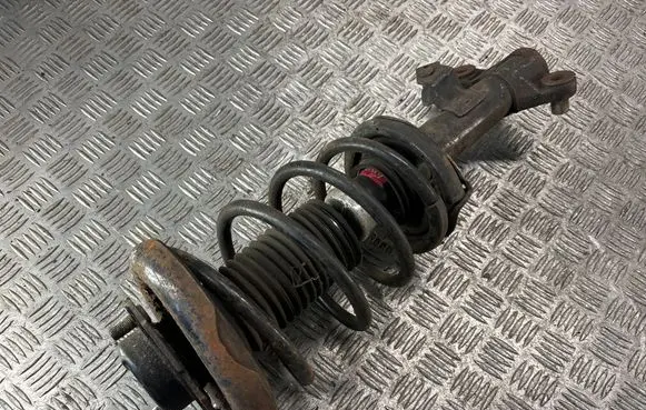 Nissan Primera Front shock absorber with coil spring