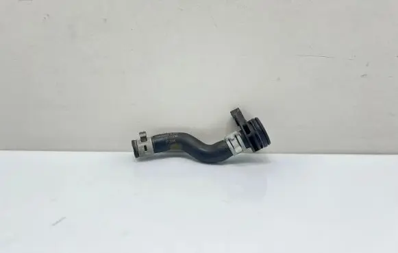 Volkswagen Golf VII Engine coolant pipe/hose 06K121051M