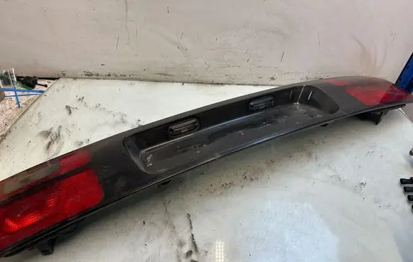 Volkswagen Sharan Trunk door license plate light bar 95VW13A582AE