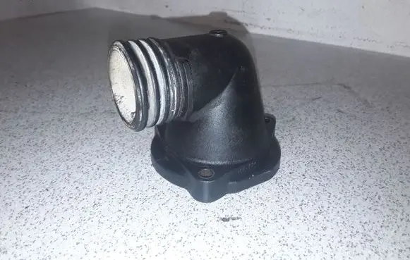 Thermostat/thermostat housing