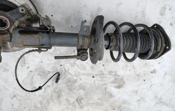 Renault Fluence Front shock absorber with coil spring 