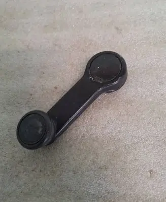 Ford Sierra Front door window winding handle 83BBA23348AB