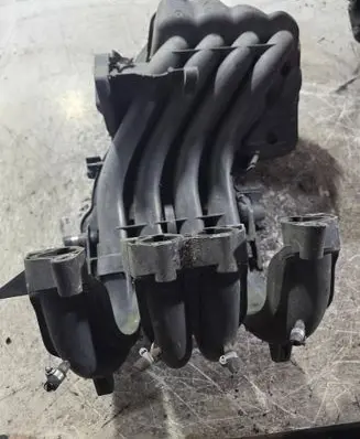 Volkswagen Golf IV Intake manifold 06A133205E