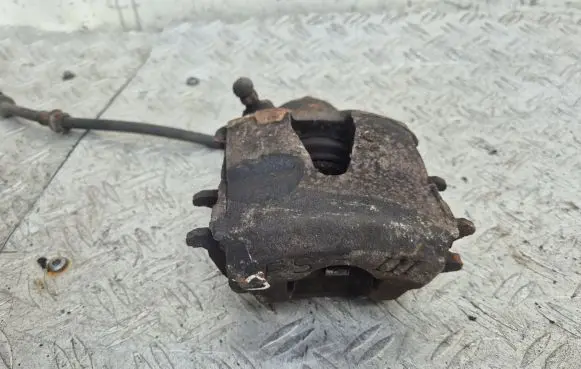Skoda Fabia Mk2 (5J) Front brake caliper