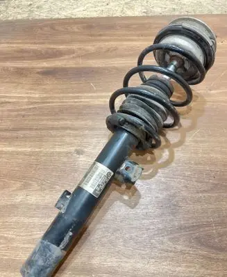 Front shock absorber with coil spring