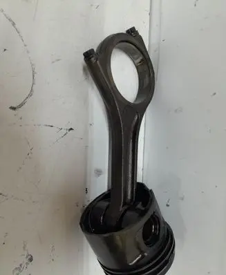 Piston with connecting rod