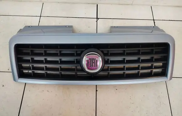 Fiat Doblo Front bumper upper radiator grill 735395576