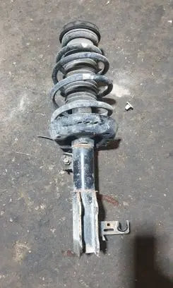 Front shock absorber with coil spring