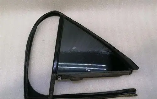 Cadillac STS Rear door window glass 25779159