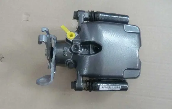 Opel Astra L Front brake caliper 39035604