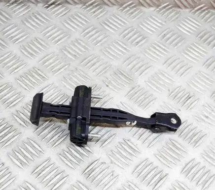 Front door check strap stopper
