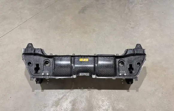 Top upper radiator support slam panel
