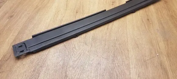 Trunk/boot lower side trim panel