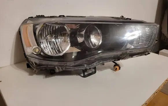 Mitsubishi Lancer VIII Headlight/headlamp P8597
