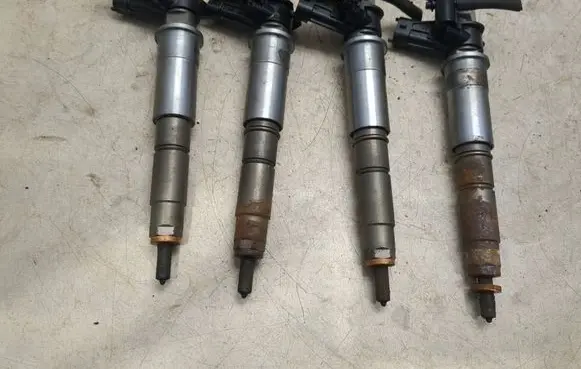 Renault Laguna III Fuel injectors set 0445115007 0712211161