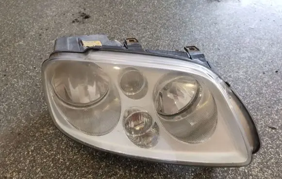 Volkswagen Touran I Headlight/headlamp 0301205202
