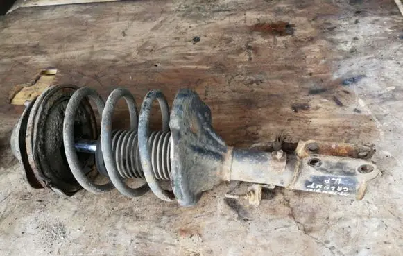 Mitsubishi Galant Front shock absorber with coil spring