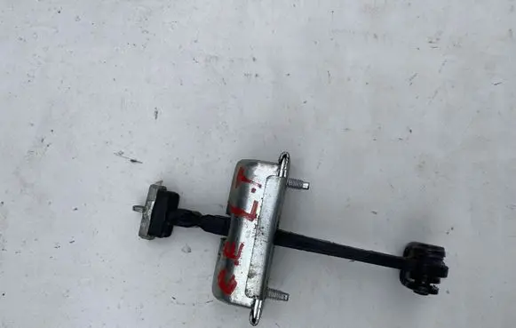 Opel Corsa E Rear door check strap stopper