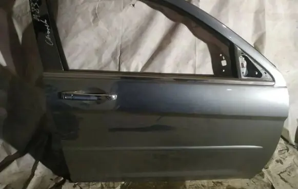 Chrysler Sebring (ST-22 - JR) Front door pilkos