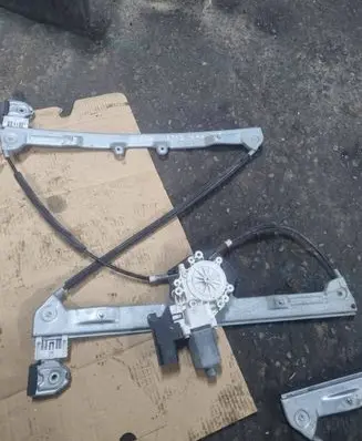 Mitsubishi Colt Front door window regulator with motor 0130822207