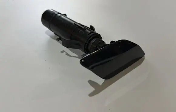 Volkswagen Touran II Headlight washer spray nozzle 1T0955104B
