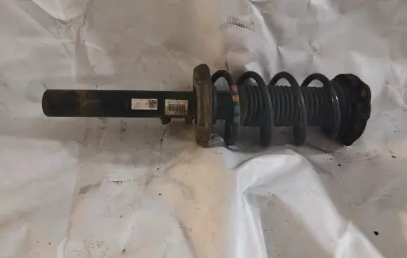 Volkswagen Golf VI Front shock absorber with coil spring 1K0412121
