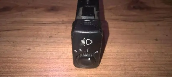 KIA Carnival Headlight level height control switch