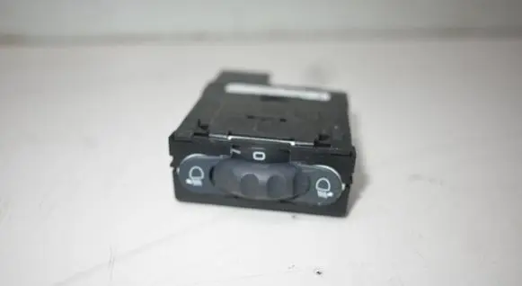 Headlight level height control switch