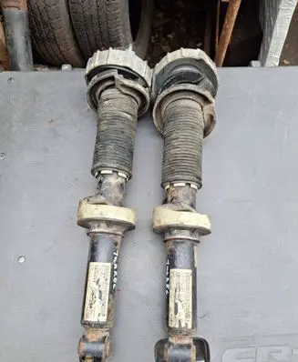 Volkswagen Touareg I Rear shock absorber with coil spring 7L6512021AC 804900558357