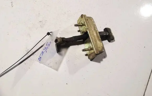 Front door check strap stopper