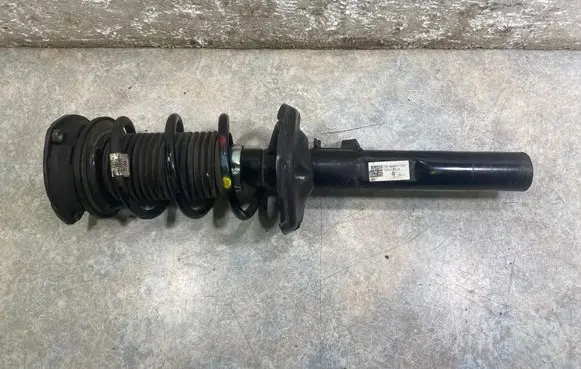 Seat Leon (5F) Front shock absorber with coil spring 5Q0413023FN