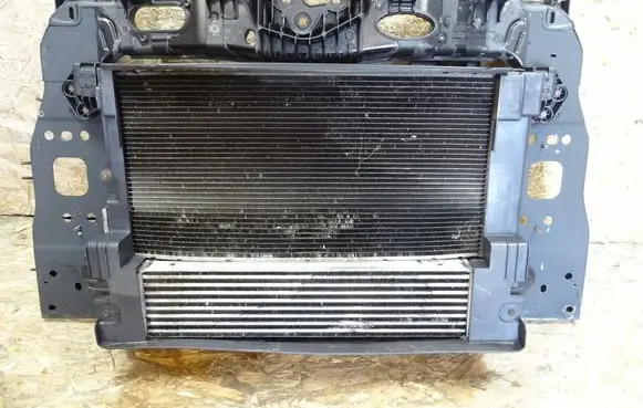 Radiator support slam panel
