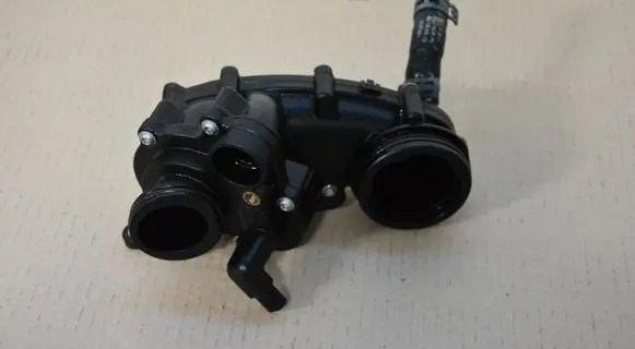 Thermostat/thermostat housing