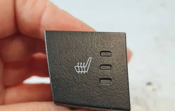 Seat heating switch